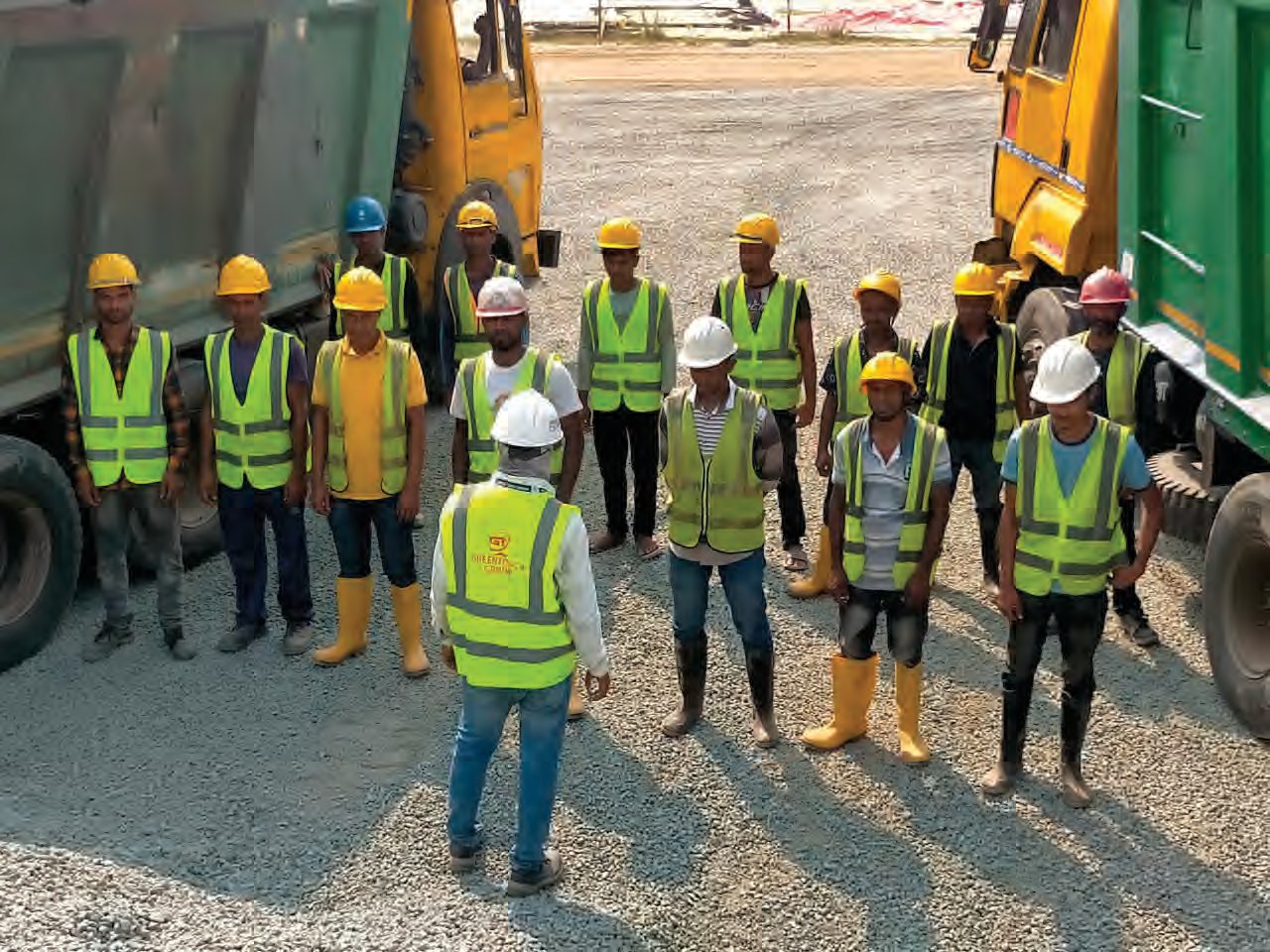 The Greentouch Stone Crusher team on site in safety gear.